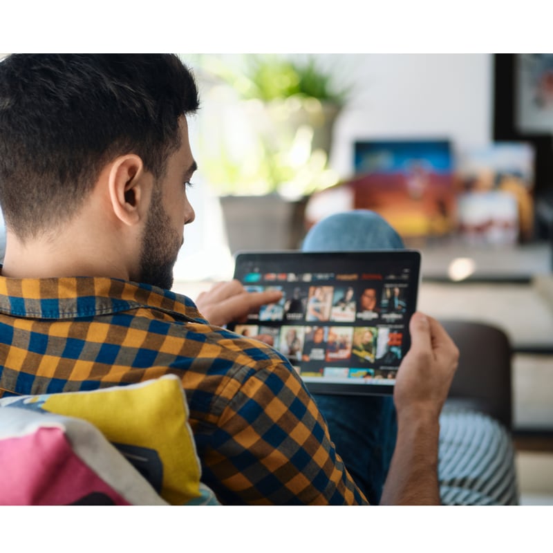 A subscriber scrolling through the Xstream Cable interface